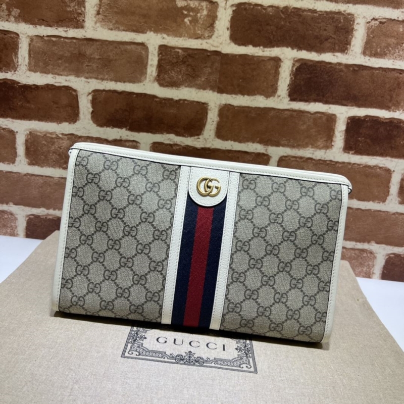 G*u*i clutch bags